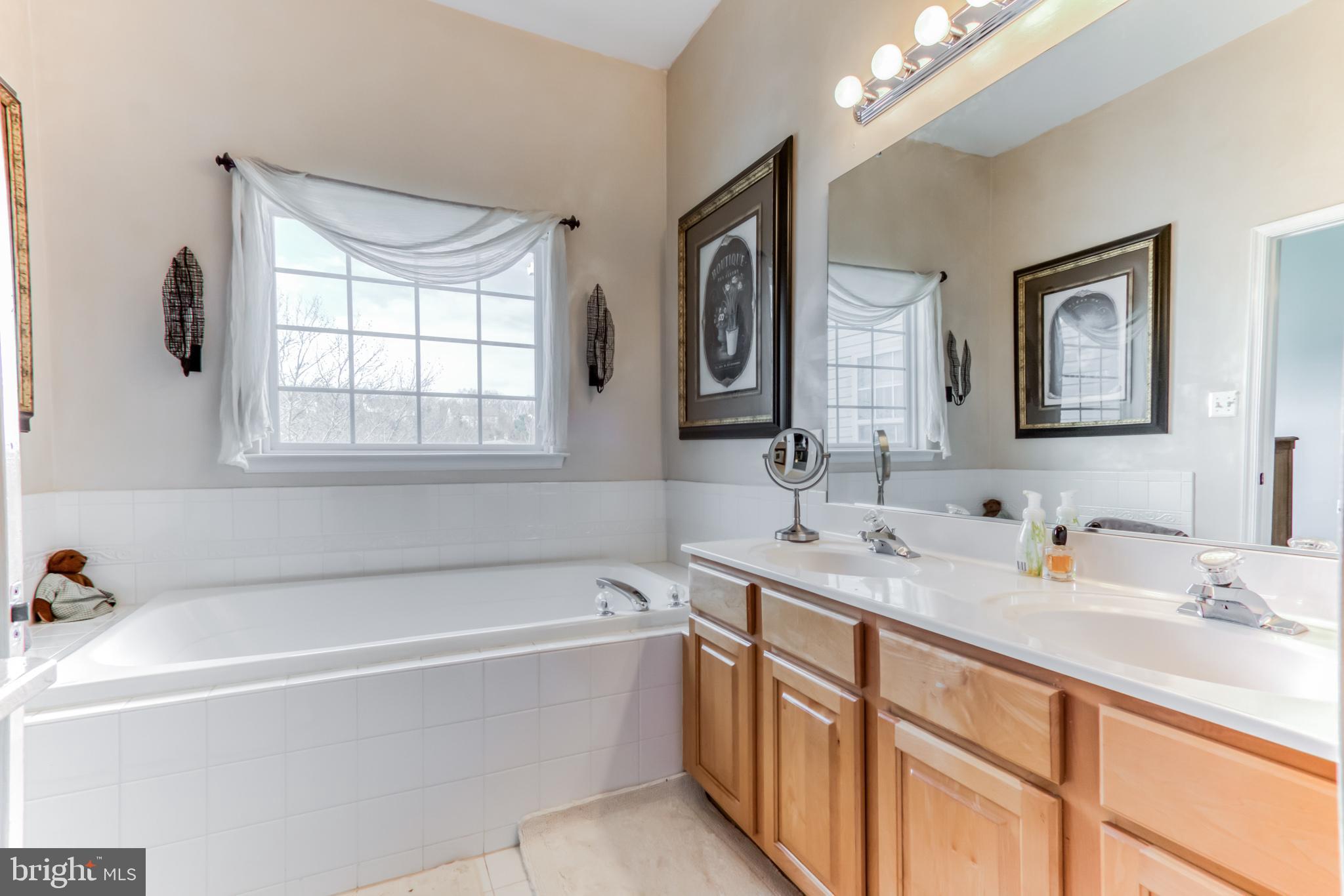613 Springhouse Square Southeast Leesburg, VA 20175 - Photo 21 of 36 Dual vanities, separate shower