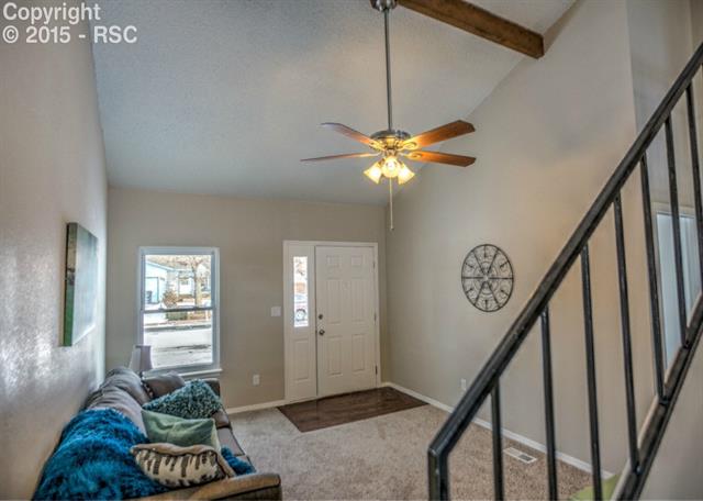 1730 Doherty Road Colorado Springs, CO 80916 - Photo 5 of 32 View of the entry from the stairway