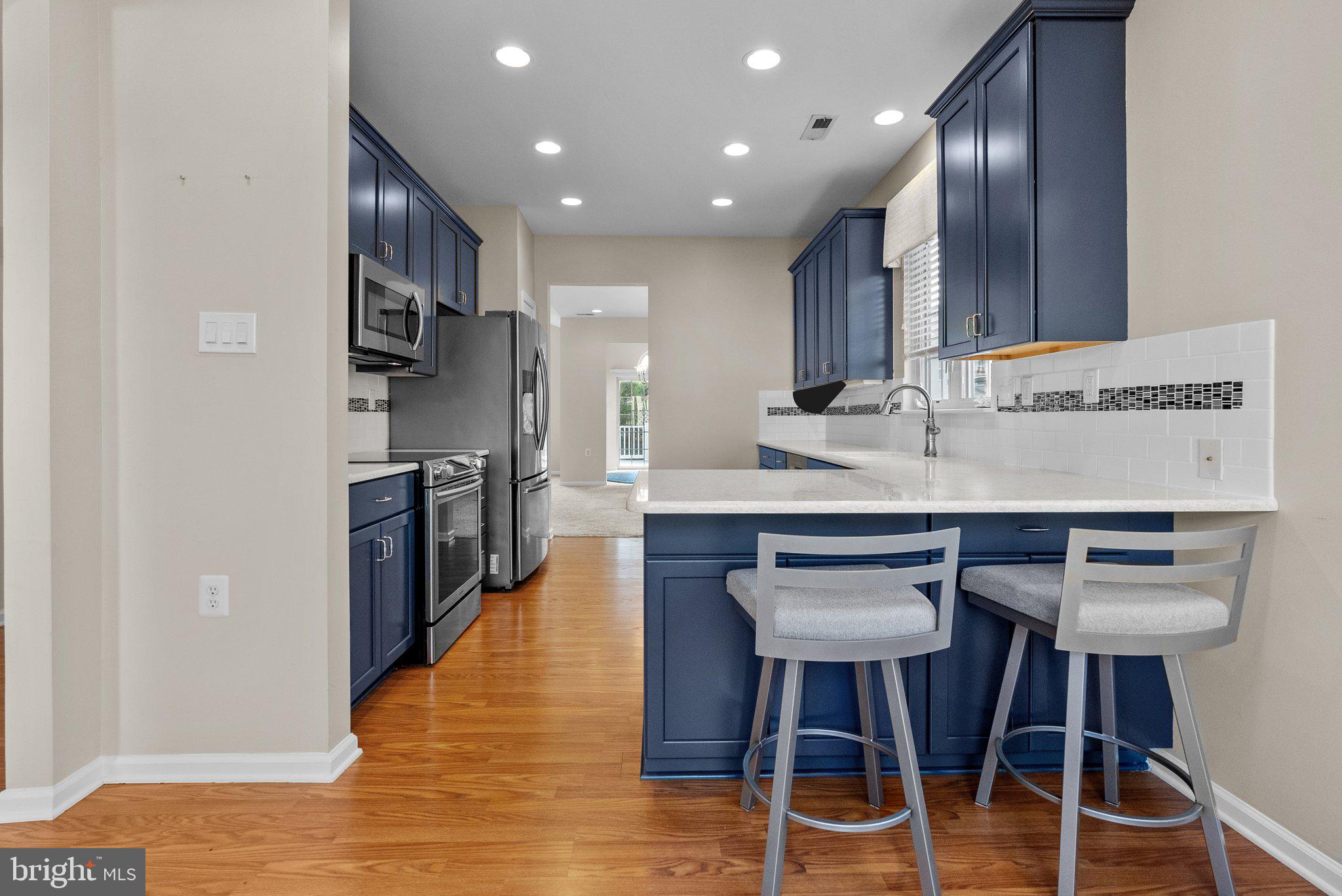 55 Bluebonnet Road Langhorne, PA 19047 - Photo 5 of 33 Kitchen with a breakfast bar