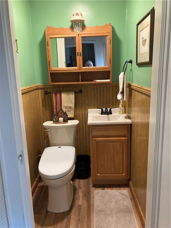 26 Paxton Road Sandy Lake, PA 16145 - Photo 14 of 23 a bathroom with a toilet sink and mirror