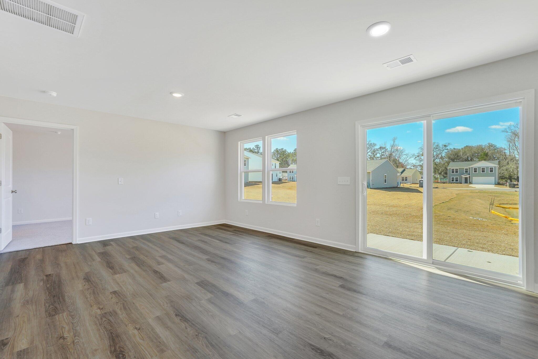 7059 Windham Way Ladson, SC 29456 - Photo 14 of 58 Family Room w/ Abundant natural light!