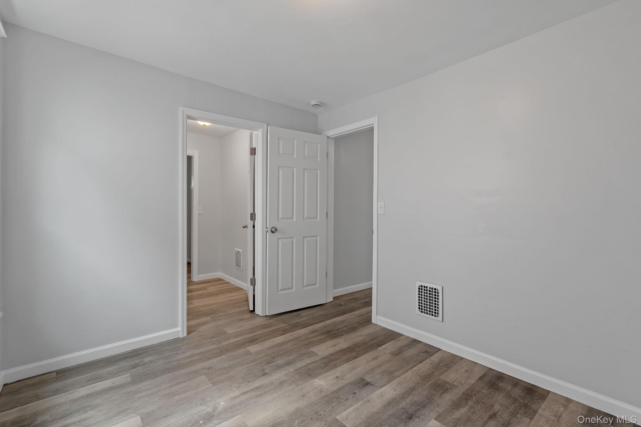 21 Lent Street Poughkeepsie, NY 12601 - Photo 12 of 47 Spare room featuring light wood-type flooring and baseboards