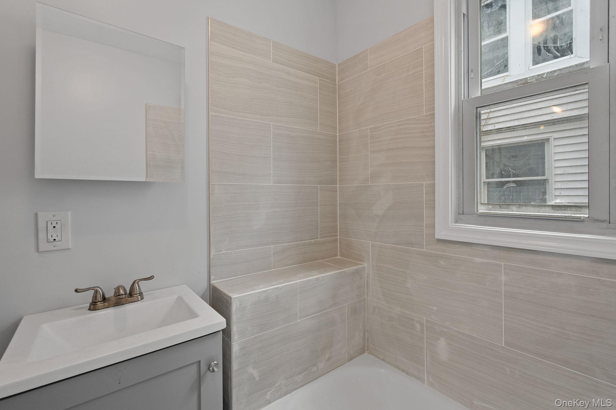 21 Lent Street Poughkeepsie, NY 12601 - Photo 25 of 47 Bathroom with vanity and shower / tub combination