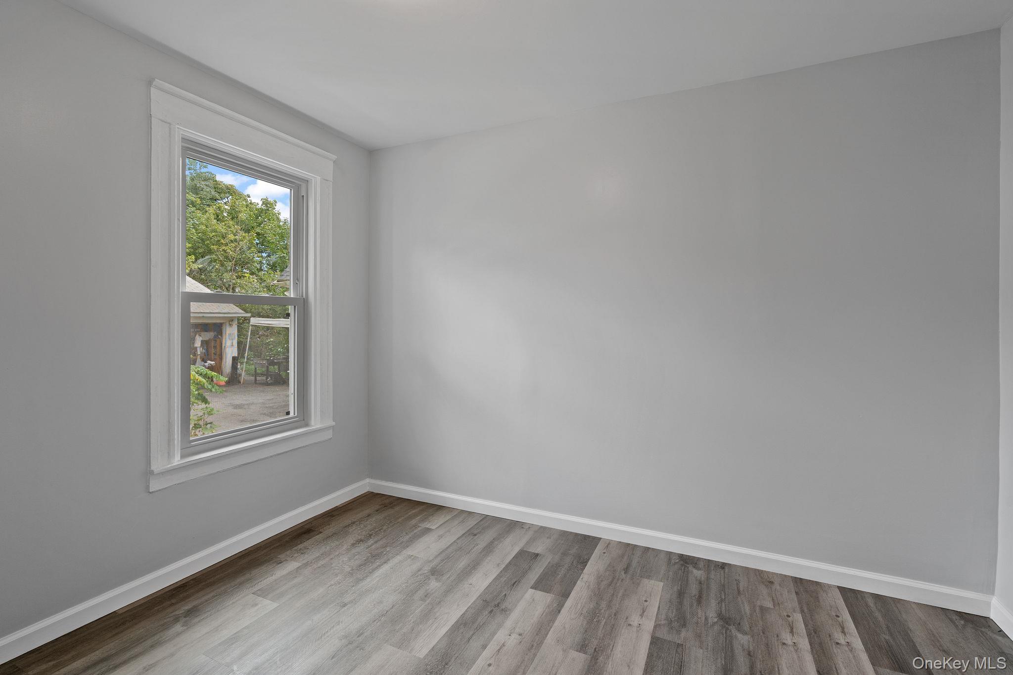 21 Lent Street Poughkeepsie, NY 12601 - Photo 27 of 47 Spare room with baseboards and light wood-style floors