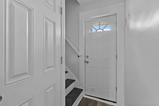 a view of an entryway with staircase