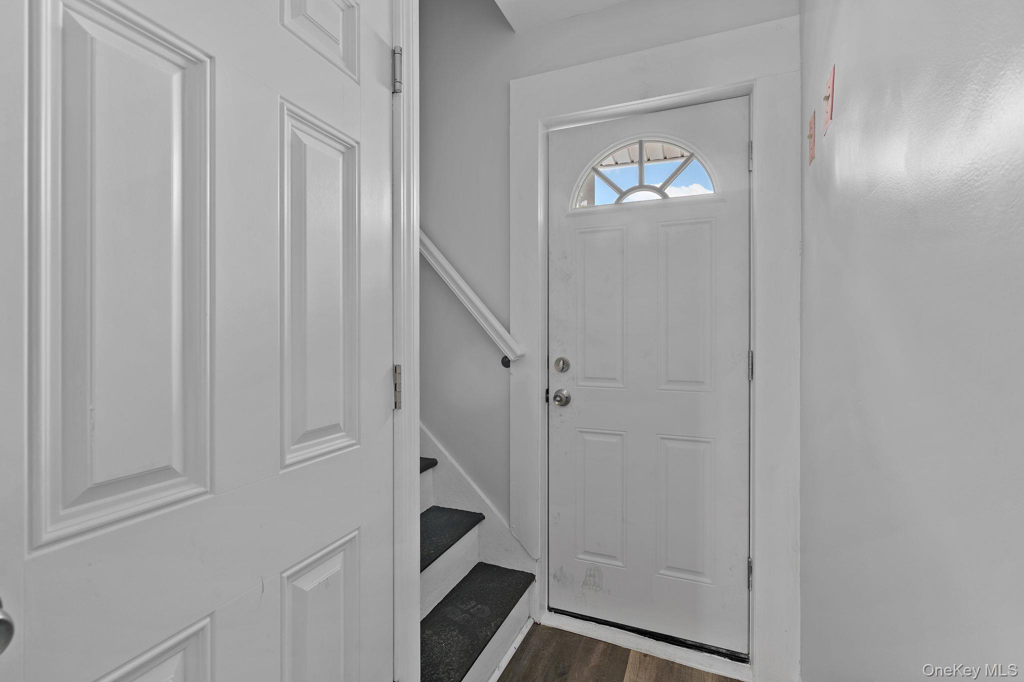 21 Lent Street Poughkeepsie, NY 12601 - Photo 29 of 47 Entryway featuring stairway and wood finished floors