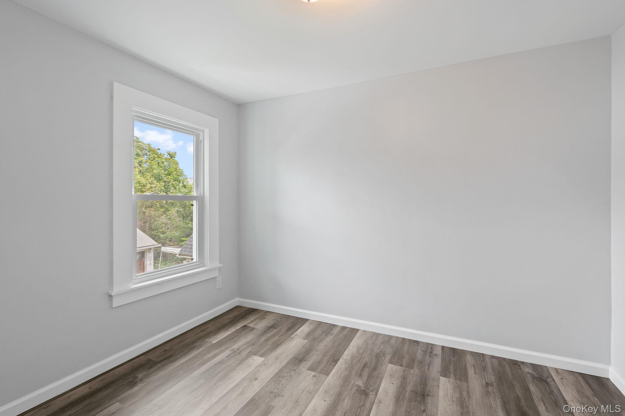 21 Lent Street Poughkeepsie, NY 12601 - Photo 36 of 47 Spare room with baseboards and wood finished floors
