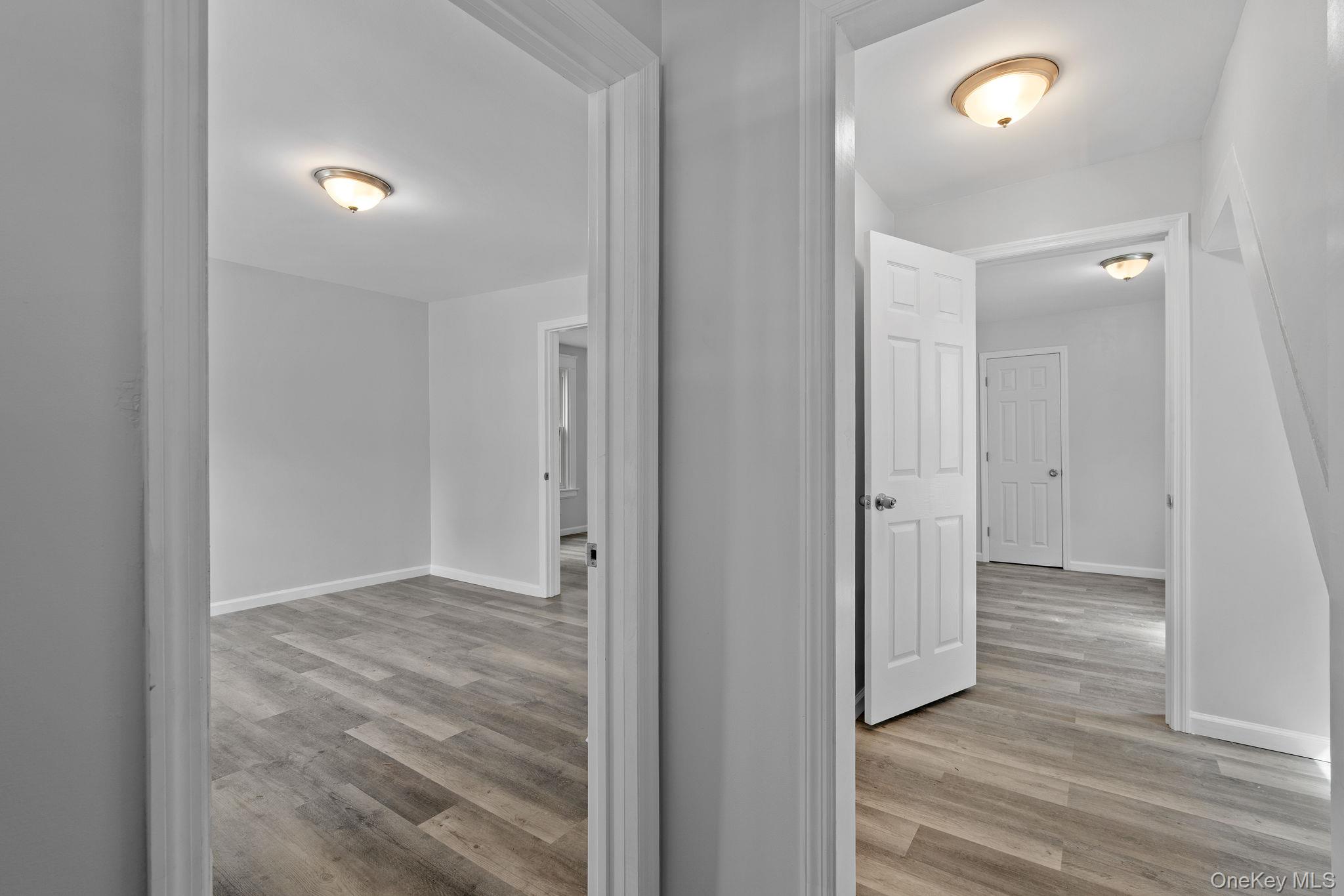 21 Lent Street Poughkeepsie, NY 12601 - Photo 9 of 47 Hallway featuring light wood finished floors and baseboards