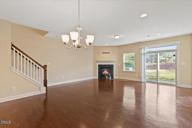 a kitchen with a sink a stove and a refrigerator