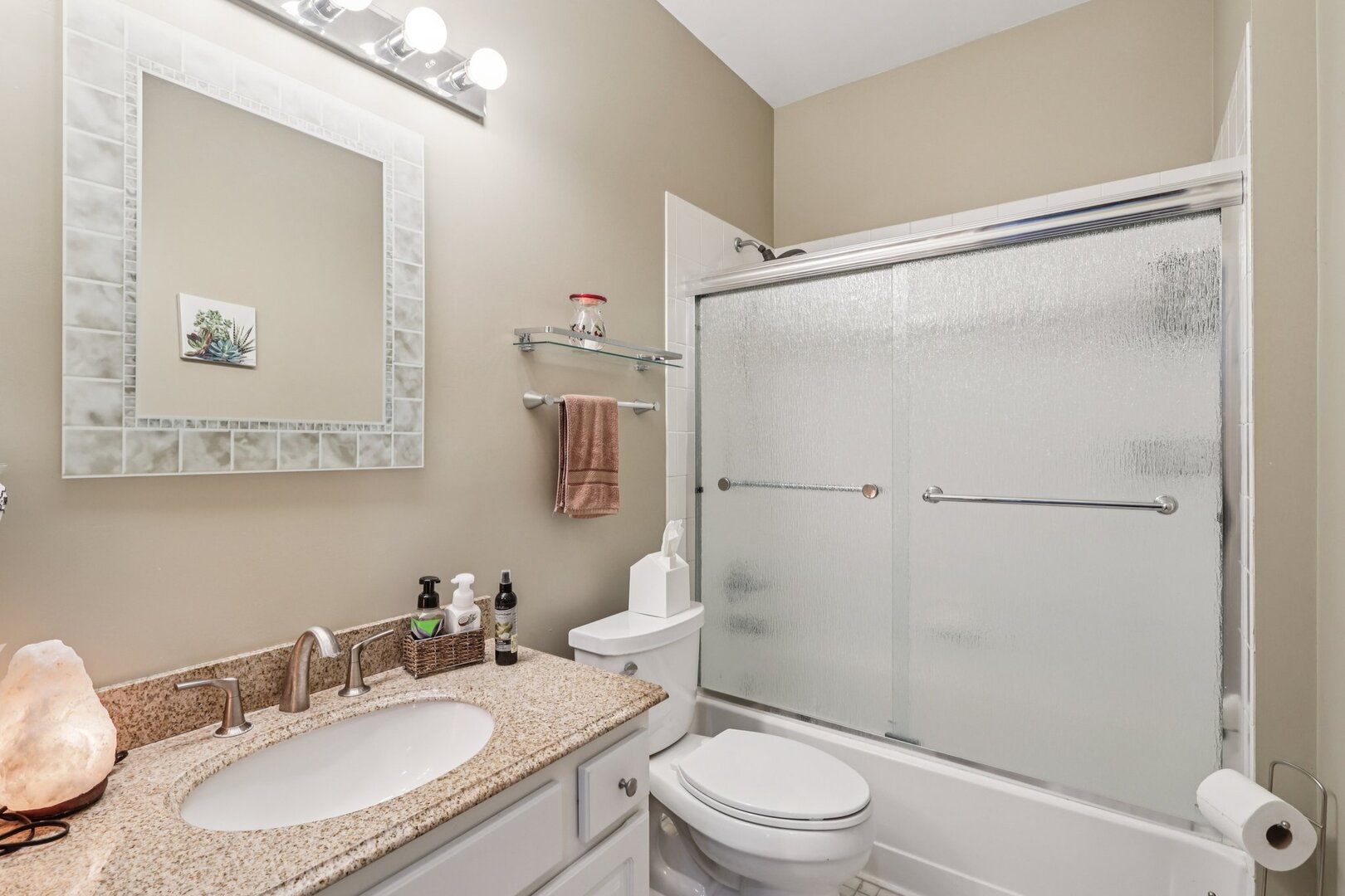 688 Cadillac Circle Romeoville, IL 60446 - Photo 19 of 45 a bathroom with a sink toilet and shower