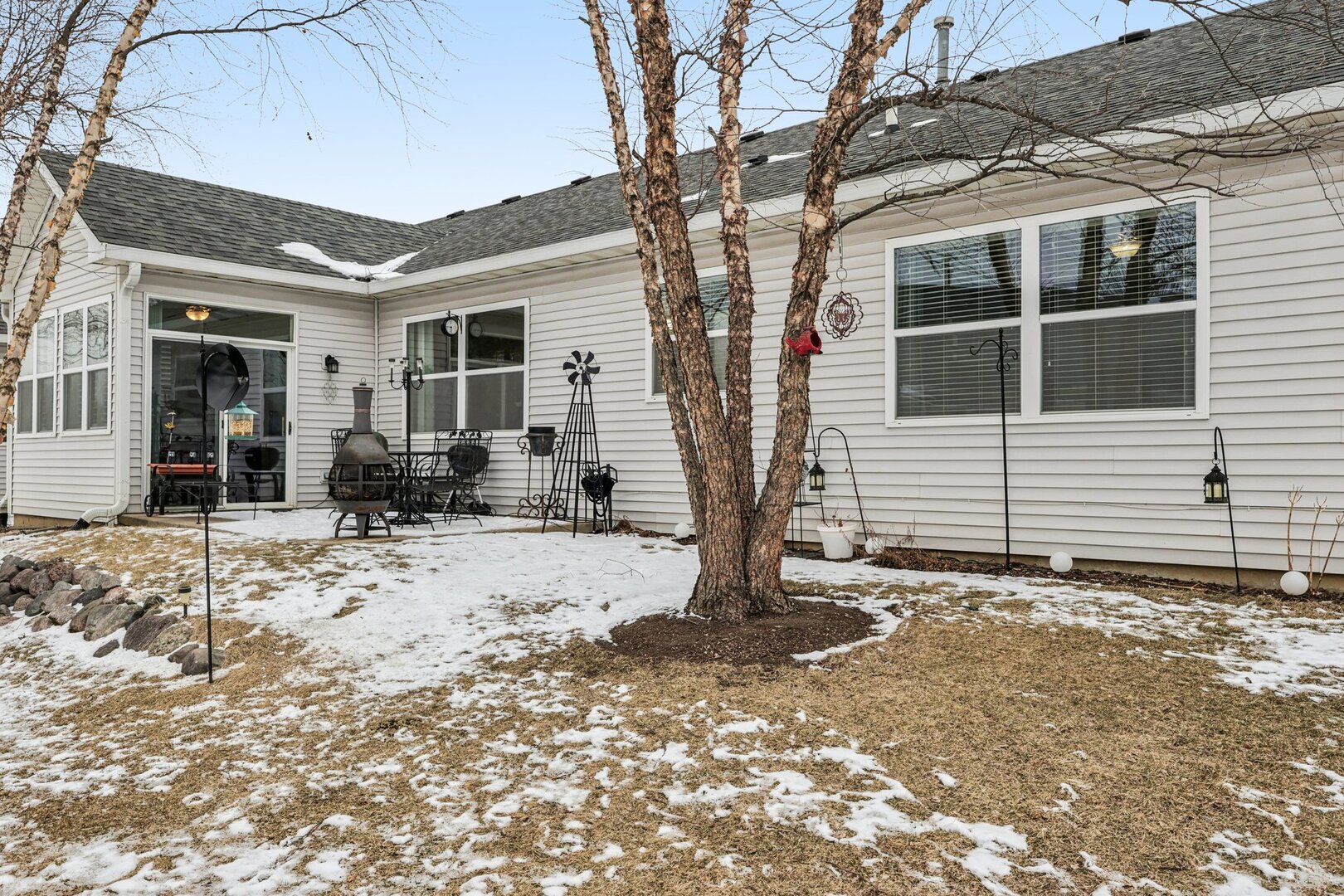 688 Cadillac Circle Romeoville, IL 60446 - Photo 24 of 45 a view of a house with a yard covered in snow