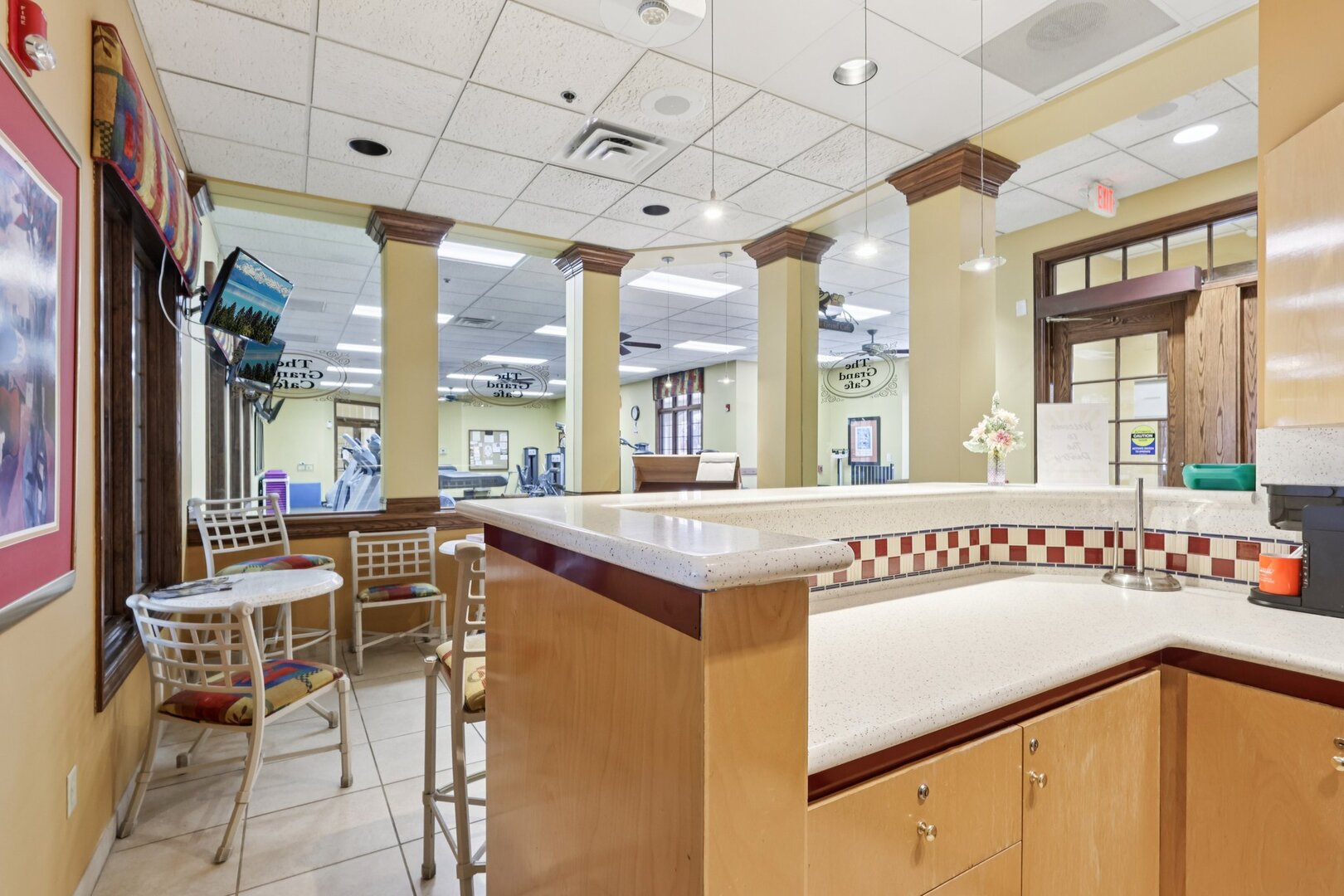 688 Cadillac Circle Romeoville, IL 60446 - Photo 36 of 45 a view of a kitchen with stainless steel appliances granite countertop a dining table and chairs