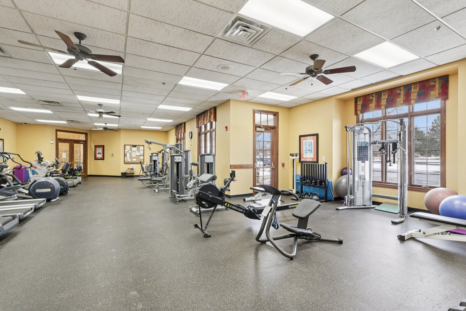 688 Cadillac Circle Romeoville, IL 60446 - Photo 42 of 45 a view of a room with gym equipment