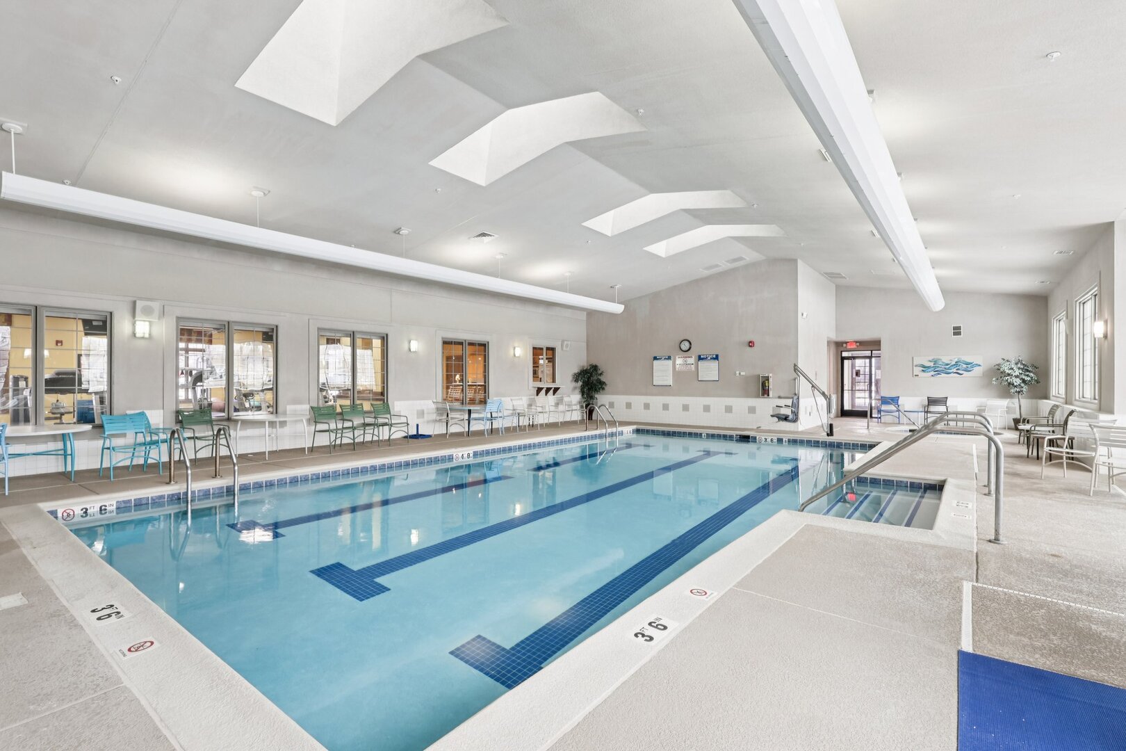 688 Cadillac Circle Romeoville, IL 60446 - Photo 45 of 45 a large kitchen with kitchen island a large counter top space a sink stainless steel appliances and cabinets
