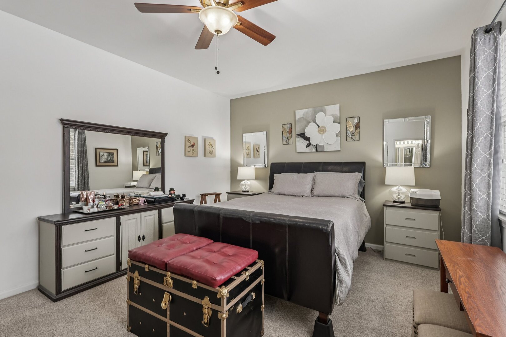 688 Cadillac Circle Romeoville, IL 60446 - Photo 5 of 45 a bedroom with a bed and a chandelier