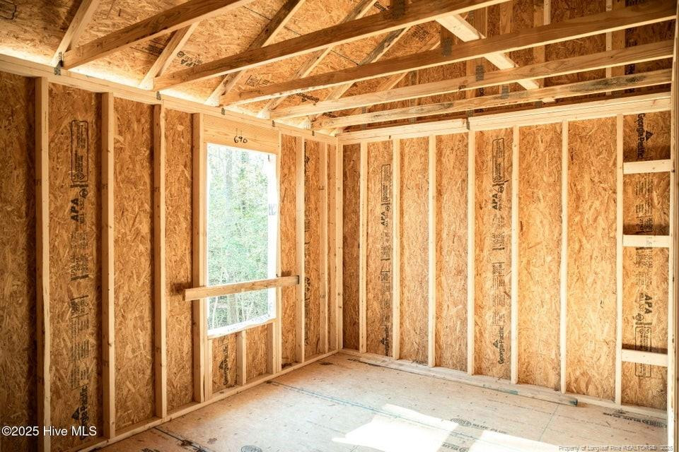 304 Monroe Road Cameron, NC 28326 - Photo 15 of 27 a view of a porch with wooden floor and doors
