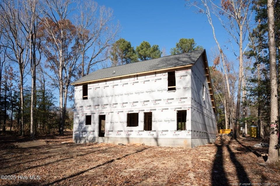 304 Monroe Road Cameron, NC 28326 - Photo 6 of 27 a view of a house with a yard