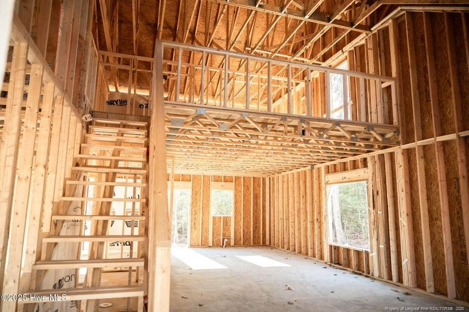 304 Monroe Road Cameron, NC 28326 - Photo 8 of 27 a view of a porch with a door and a chair