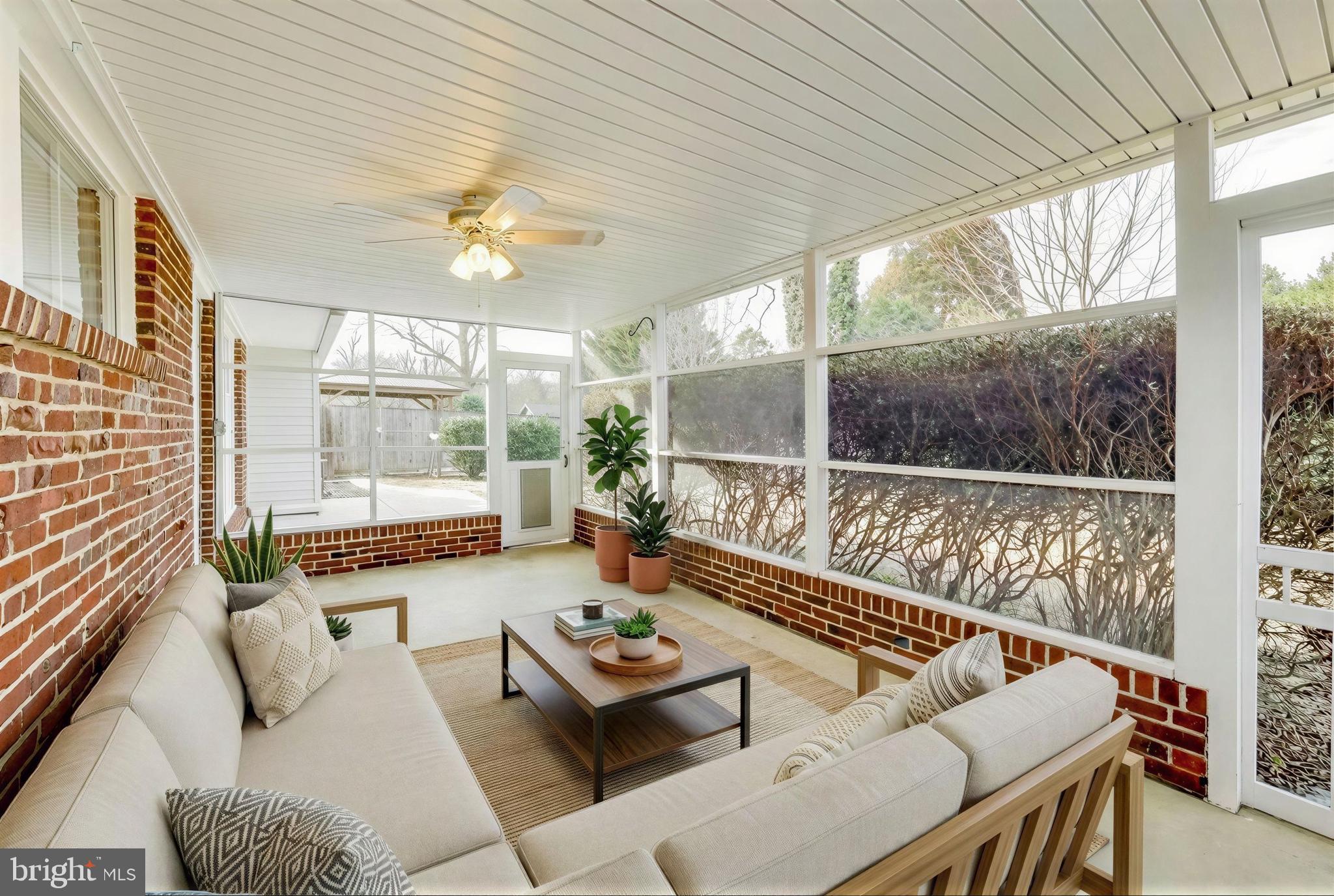 7402 Inzer Street Springfield, VA 22151 - Photo 25 of 49 Virtually Staged Porch Overlooking Backyard