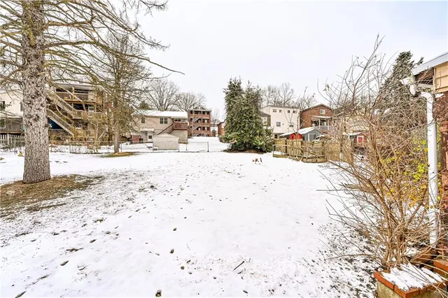 a view of a snow on the road