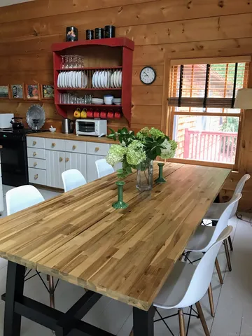 a view of a kitchen with furniture and window