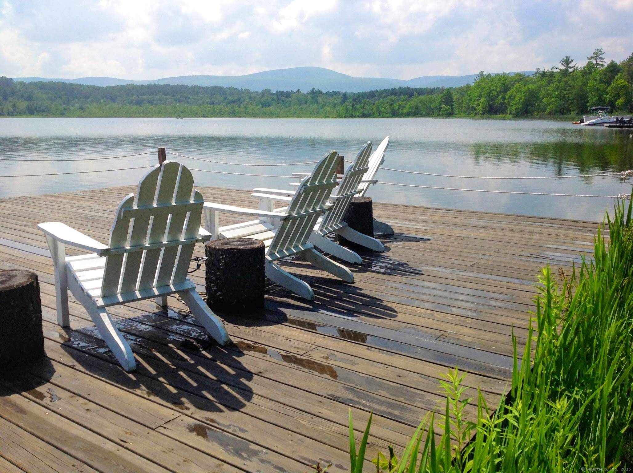 310 Twin Lakes Road Salisbury, CT 06068 - Photo 5 of 31 a view of a lake with a terrace
