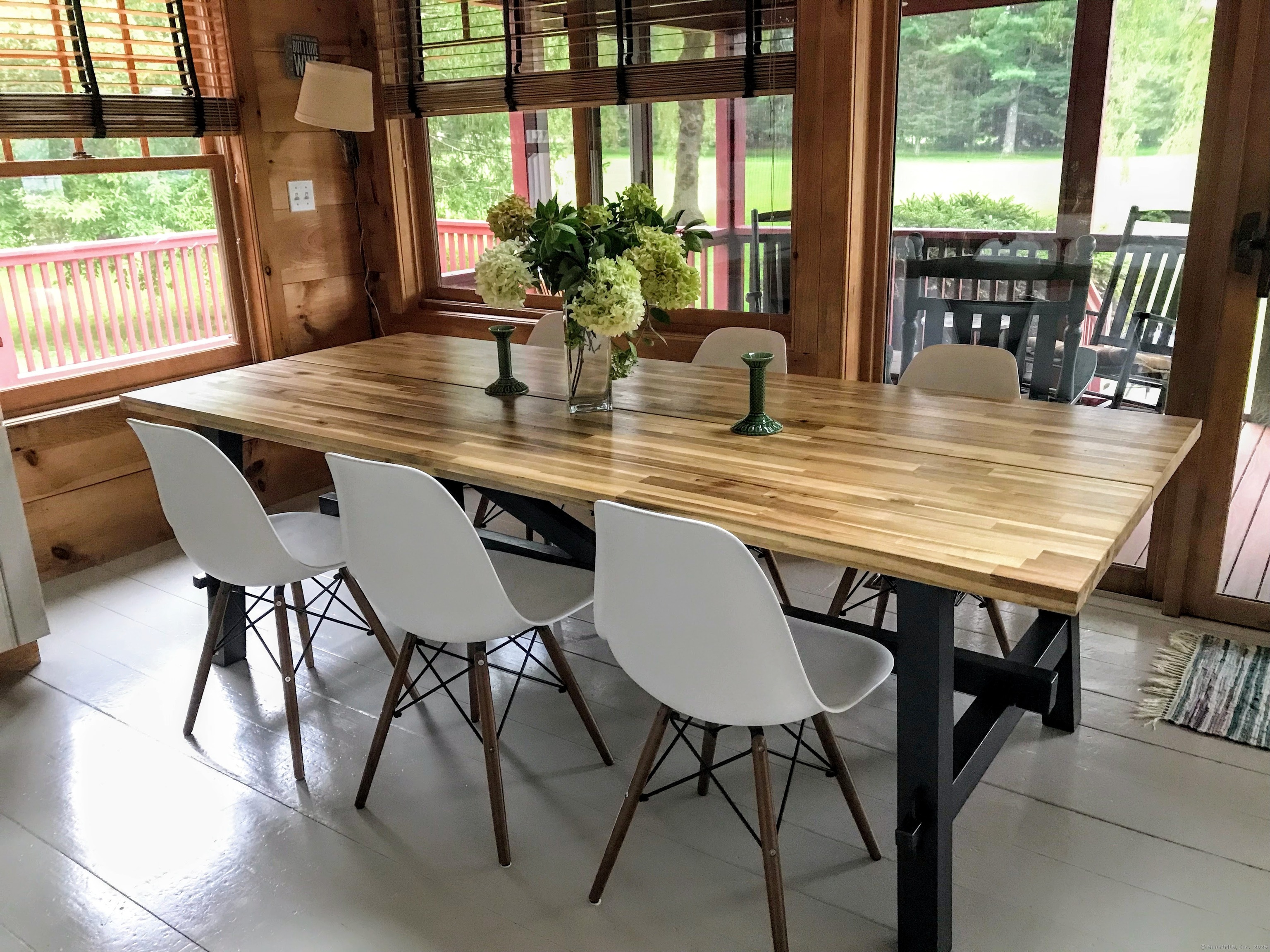 310 Twin Lakes Road Salisbury, CT 06068 - Photo 8 of 31 a view of a dining room with furniture window and wooden floor