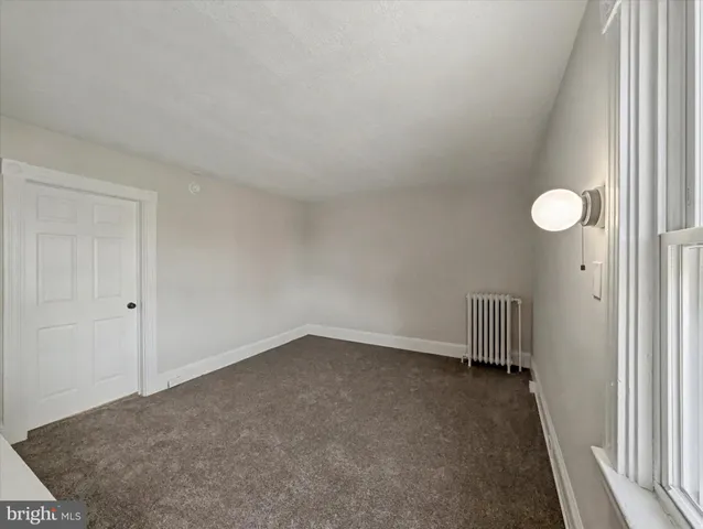 a view of a room that has a window