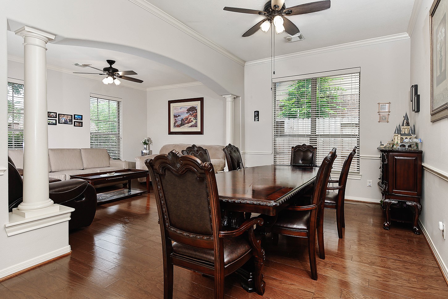 18722 Duke Lake Drive Spring, TX 77388 - Photo 7 of 26 a view of a dining room with furniture window and wooden floor
