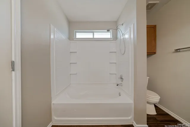 a bathroom with a bathtub