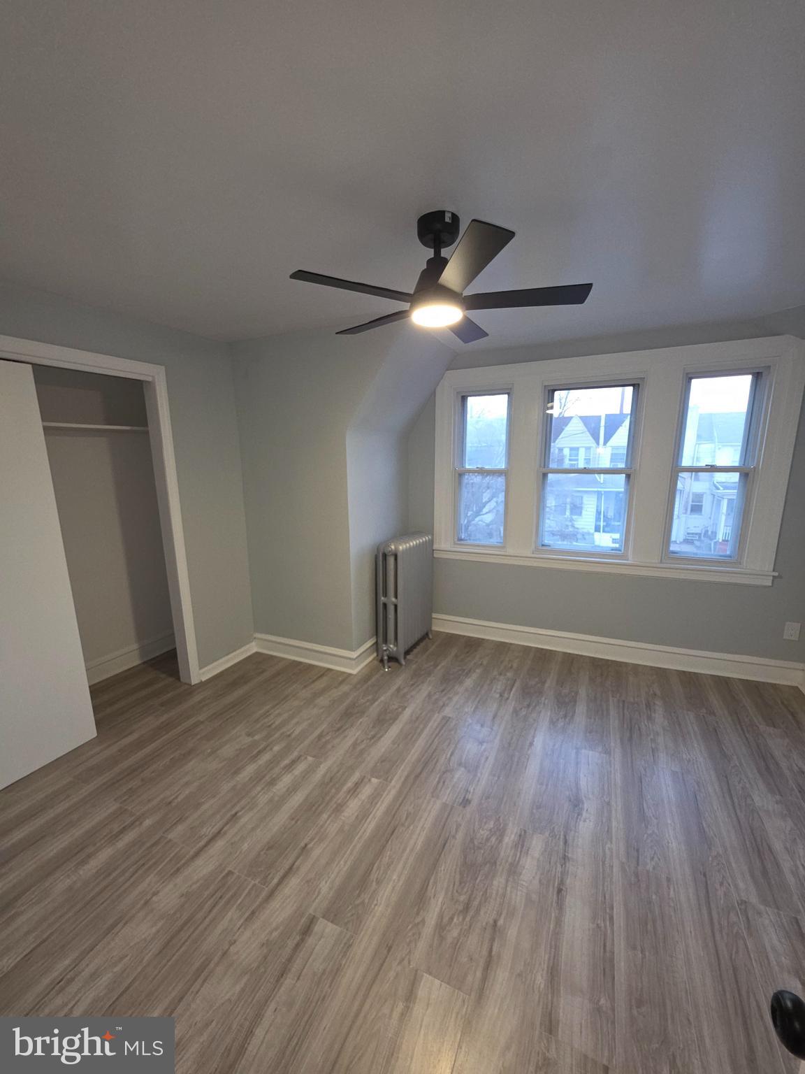 86 Houston Road Lansdowne, PA 19050 - Photo 11 of 17 a view of an empty room with wooden floor and a window