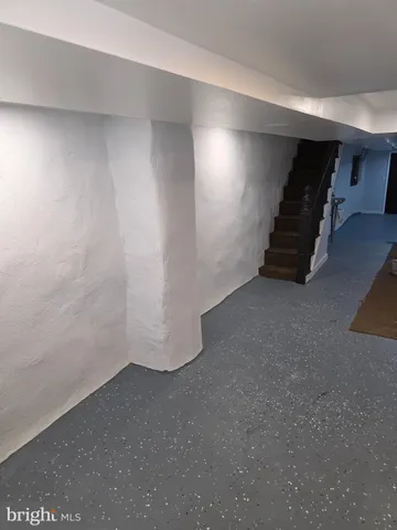 a view of an empty room and storage