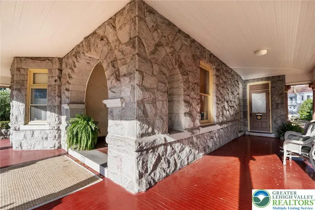 a aerial view of a house with a lake view