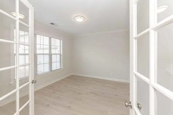 a living room with furniture fireplace and a flat screen tv