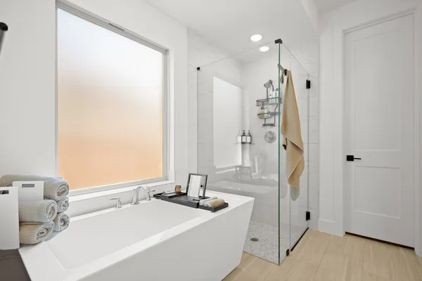 a bedroom with furniture and a flat screen tv