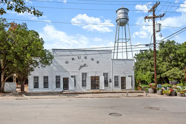 a view of a building with a street
