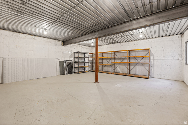 4117 North Wolf Ridge Circle Eden, UT 84310 - Photo 43 of 63 Expansive concrete floor space with exposed concrete walls