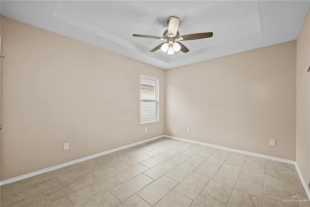 a view of a big room with carpet