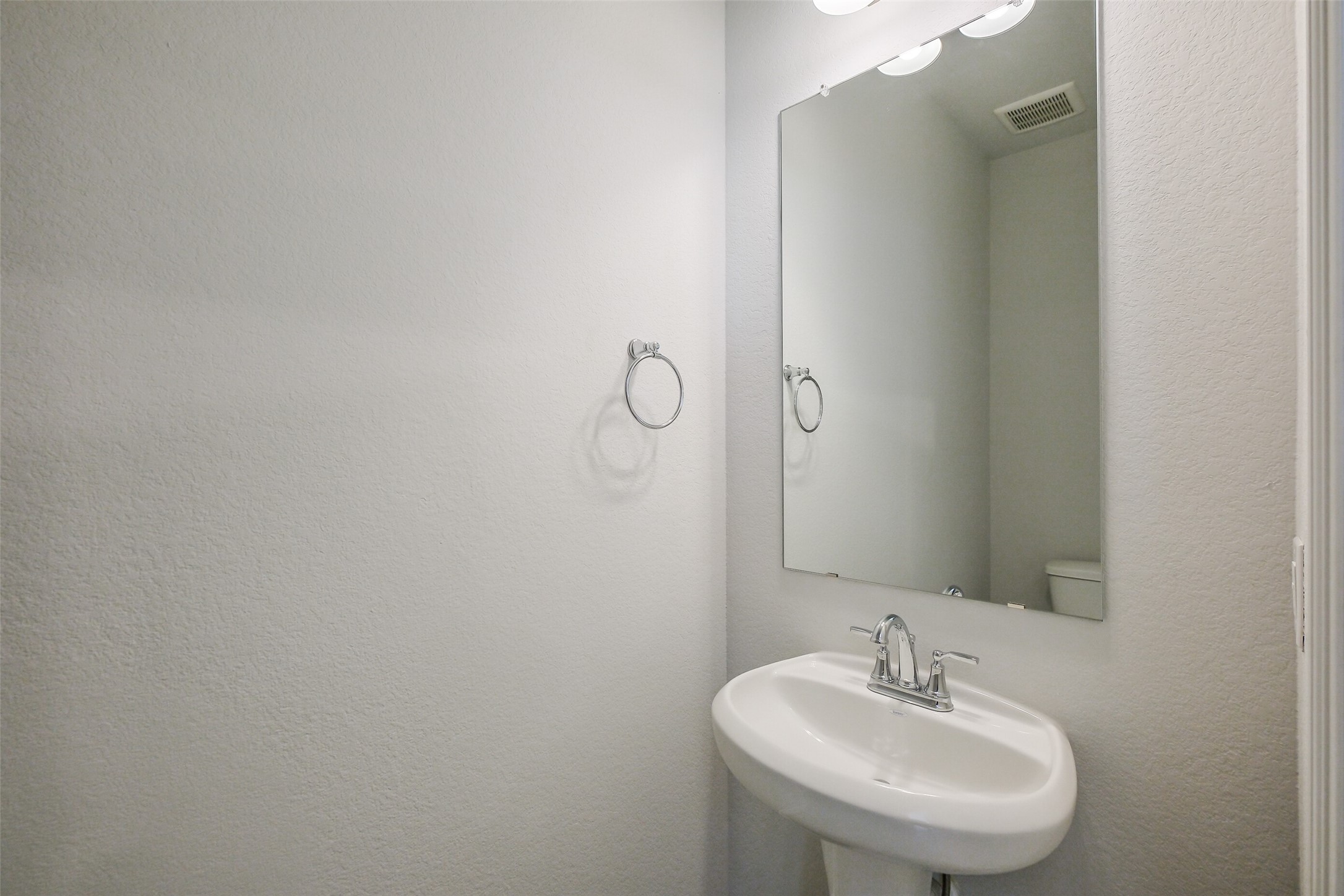 6411 Paris Street Houston, TX 77021 - Photo 17 of 33 a bathroom with a sink and mirror