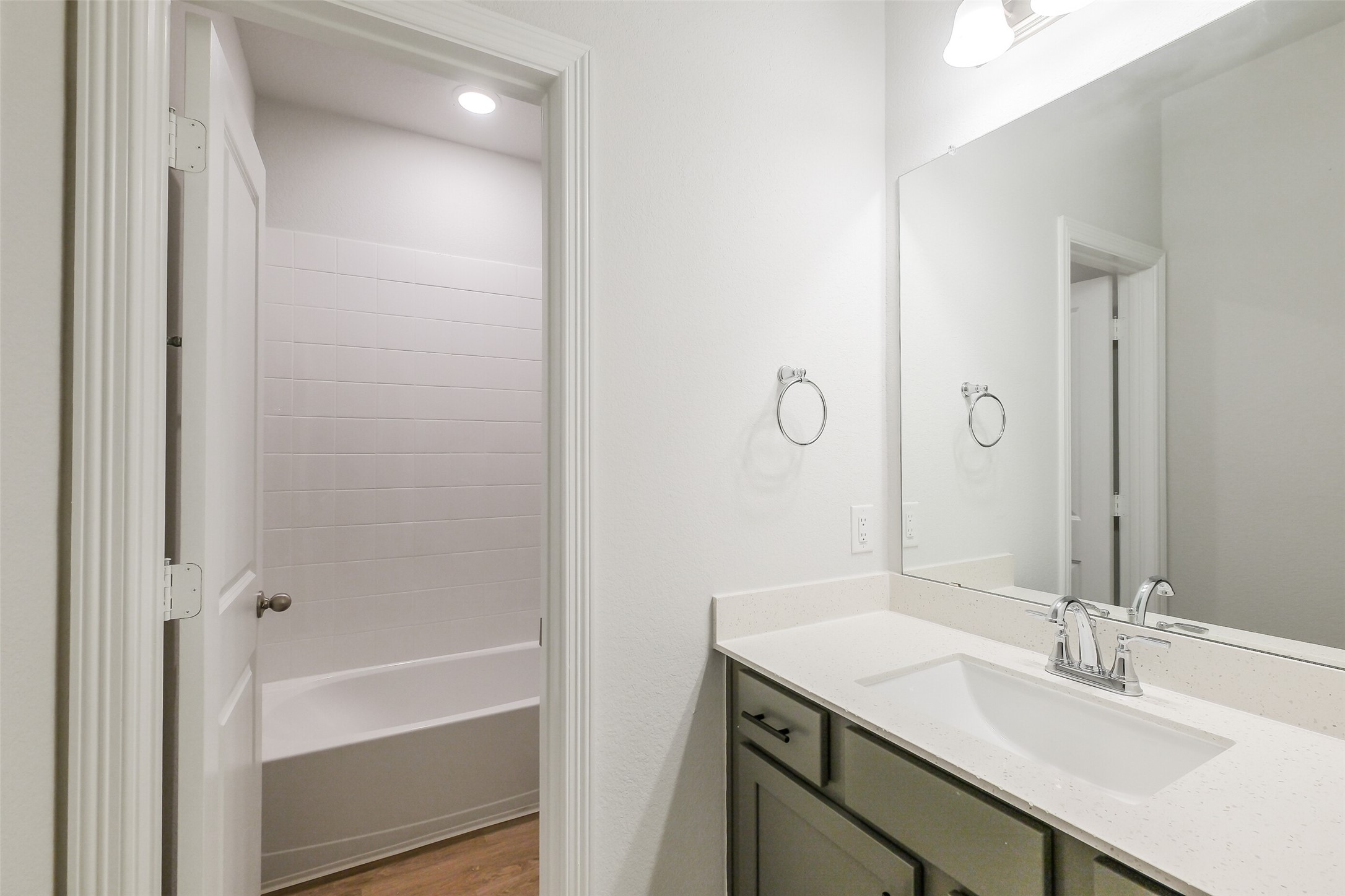 6411 Paris Street Houston, TX 77021 - Photo 28 of 33 a bathroom with a granite countertop sink and a mirror