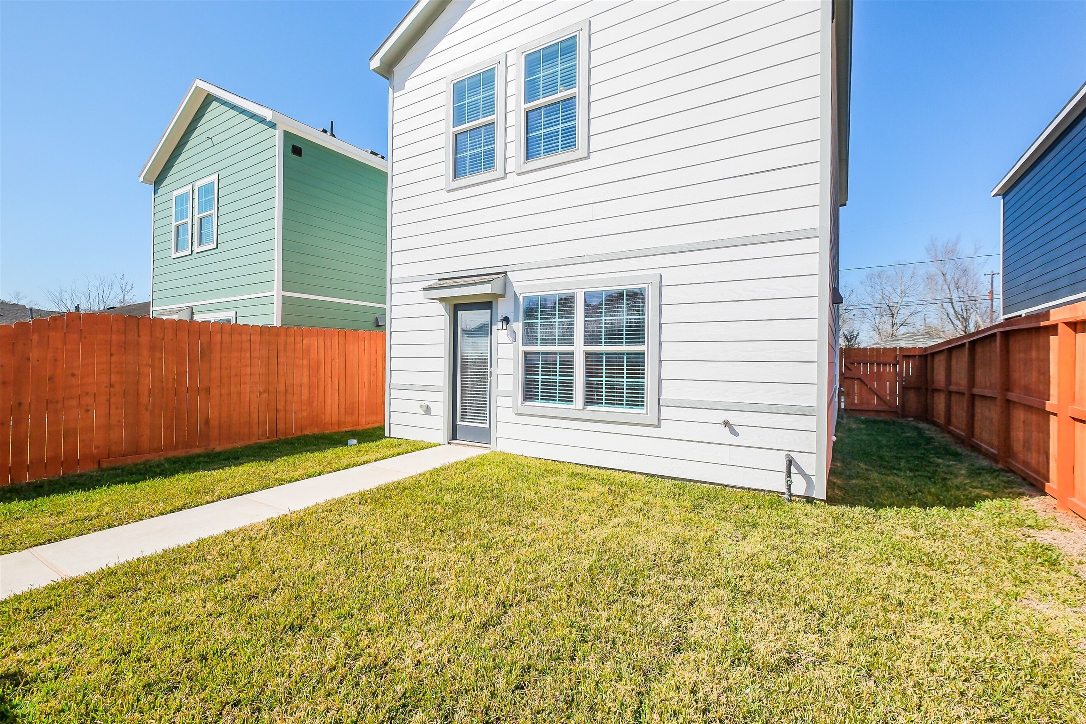6411 Paris Street Houston, TX 77021 - Photo 30 of 33 a view of a backyard with wooden fence