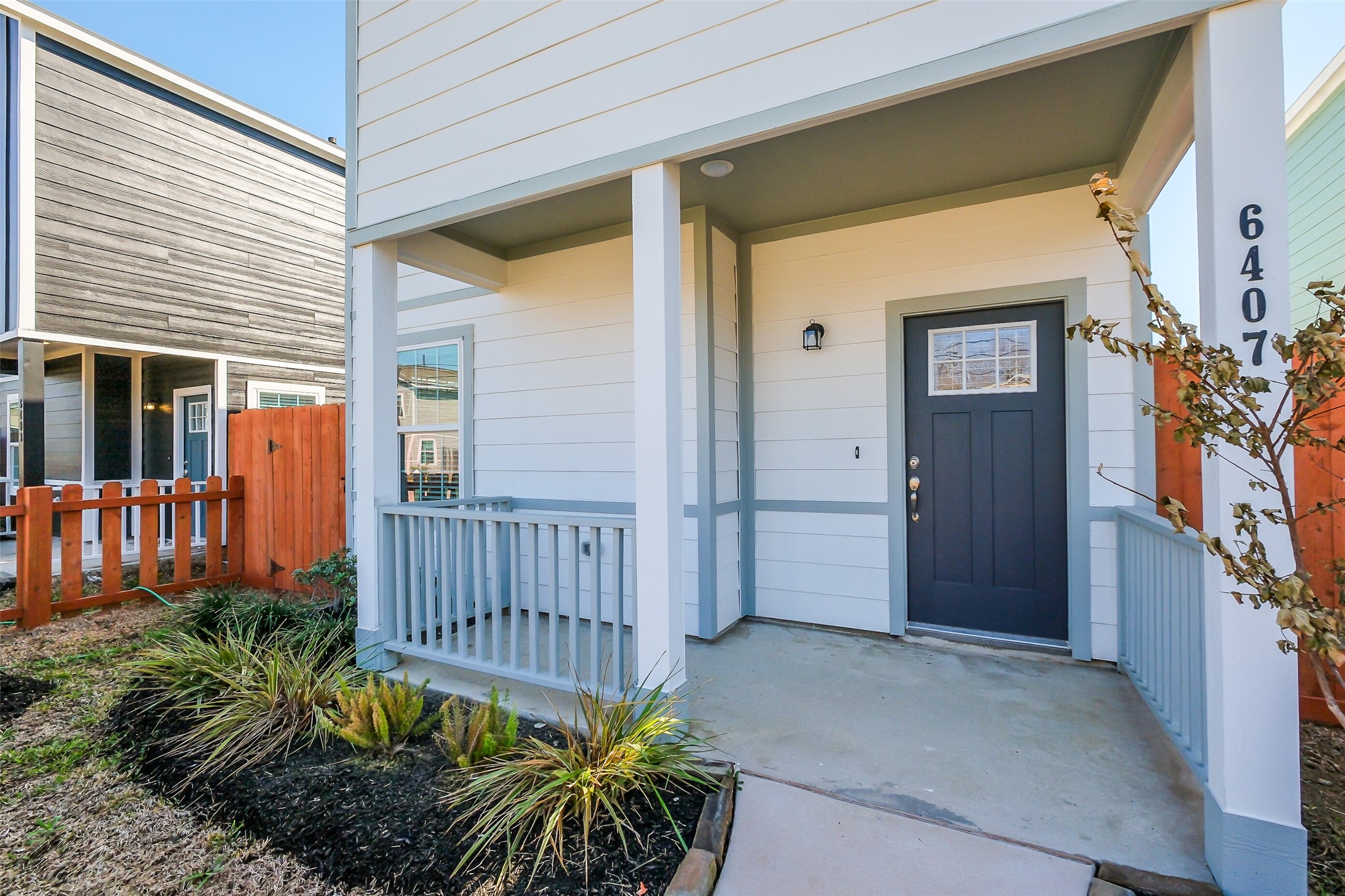 6411 Paris Street Houston, TX 77021 - Photo 4 of 33 a view of a house with a flower garden