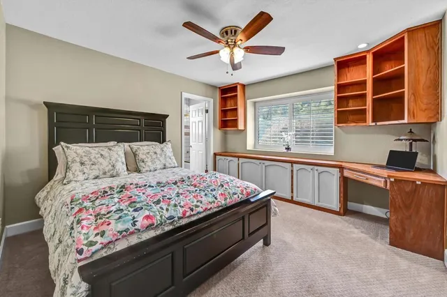 a view of a kitchen with a sink and cabinets