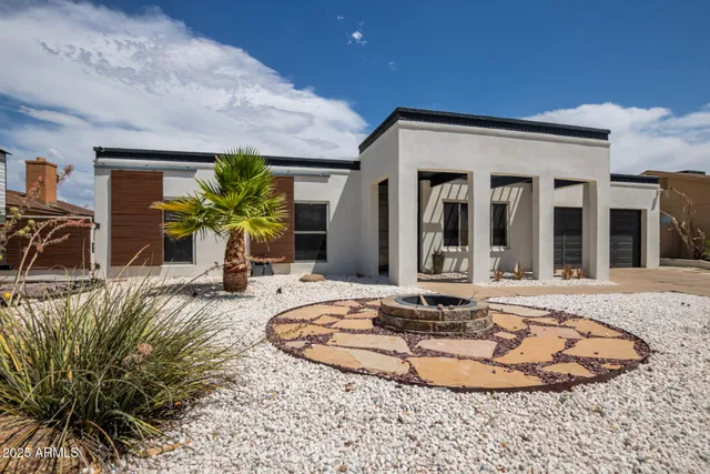 a view of a house with a swimming pool