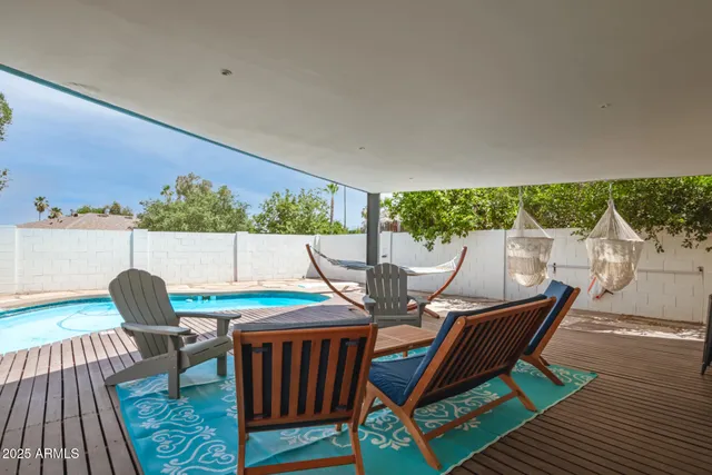 swimming pool view with a outdoor space