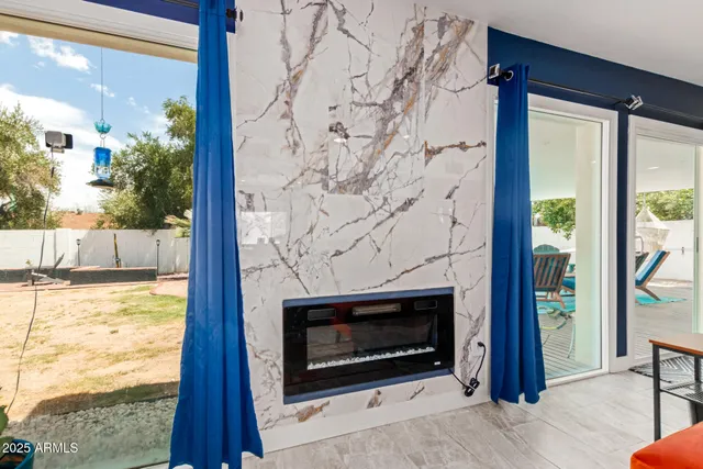 a living room with a fireplace