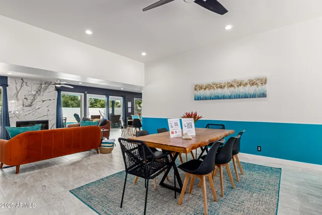 a view of a dining room with furniture window and outside view