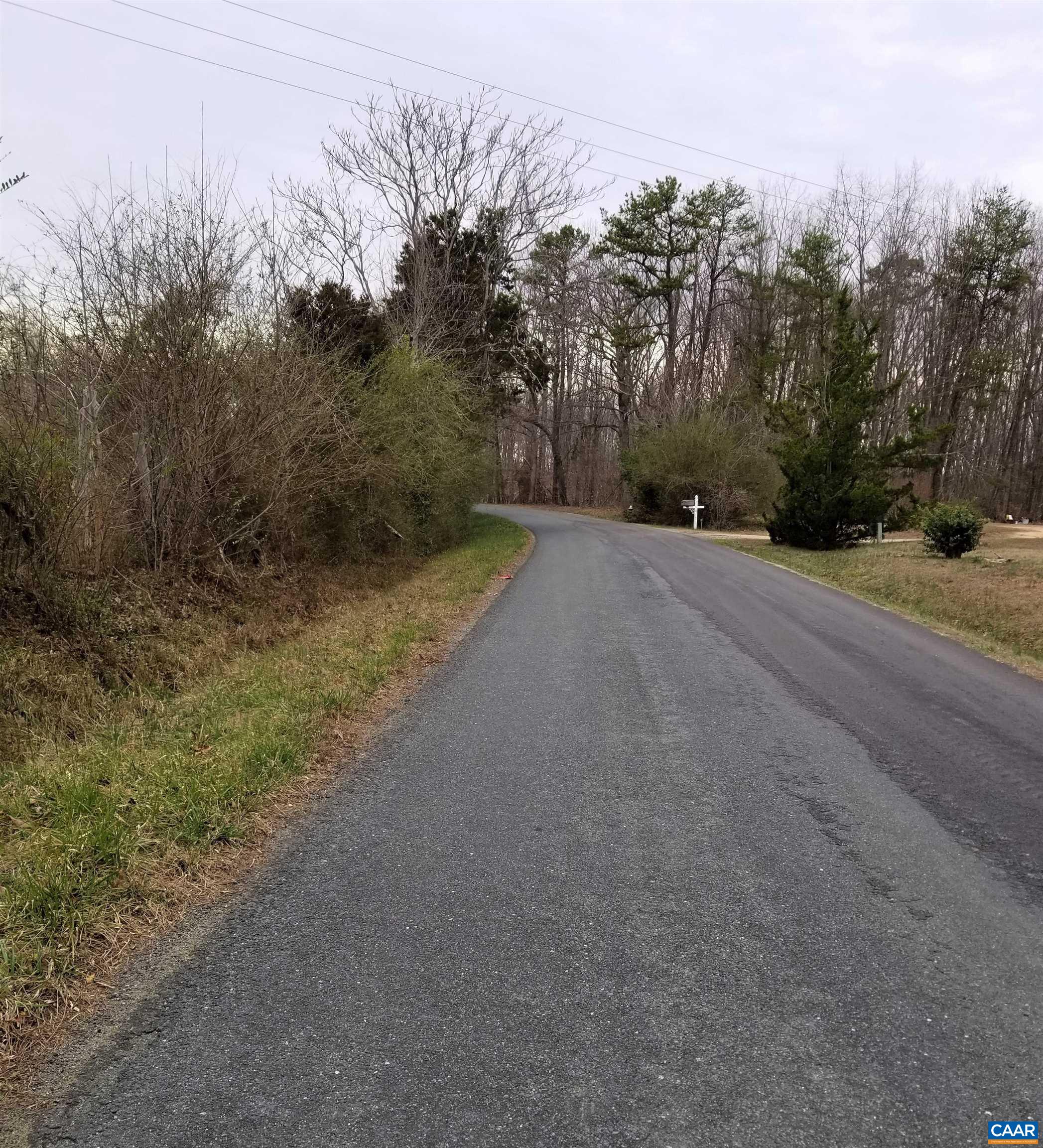 Spring Road Bremo Bluff, VA 23022 - Photo 2 of 4 a view of a dirt road with a building in the background