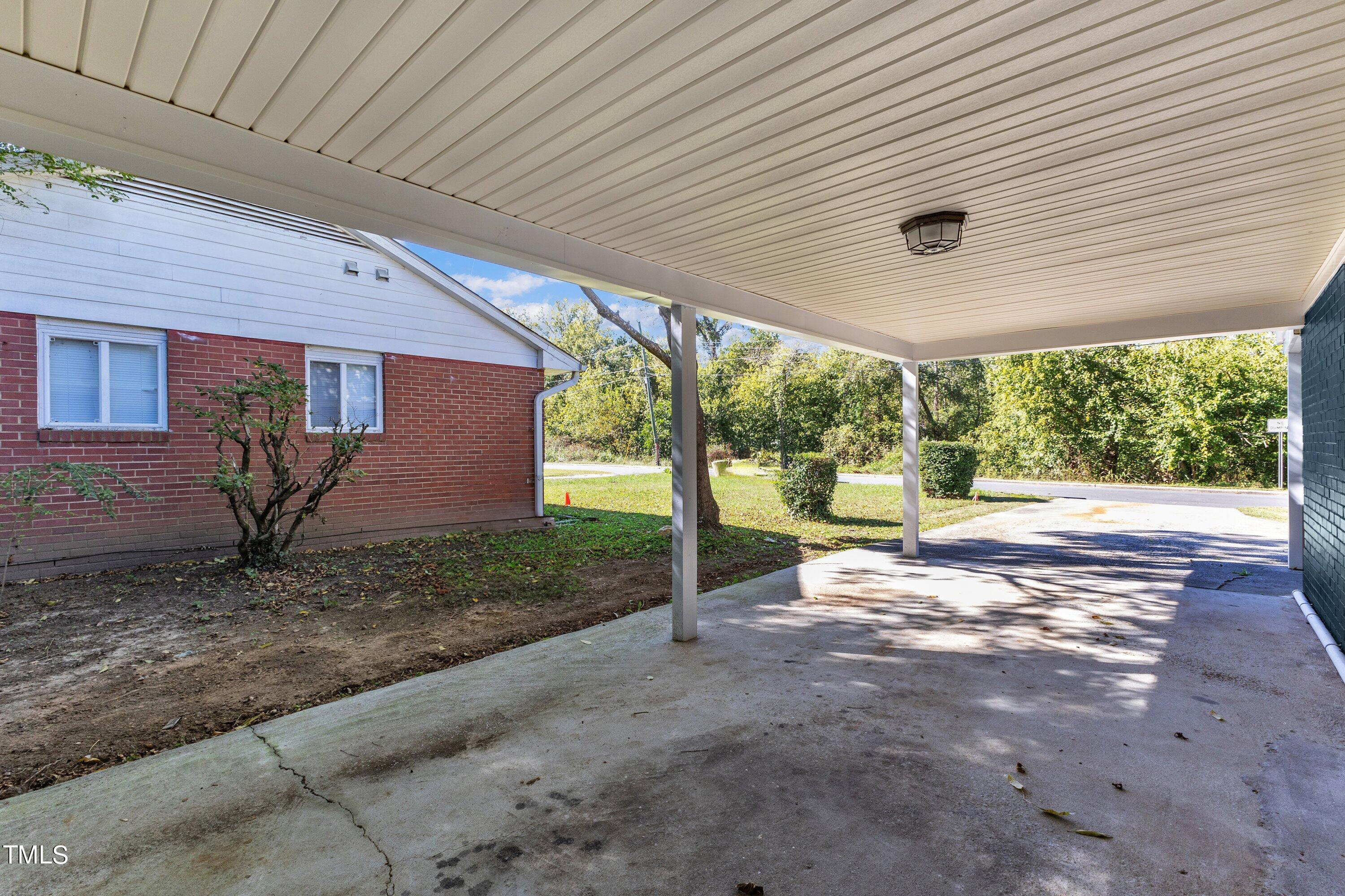 712 Bailey Drive Raleigh, NC 27610 - Photo 25 of 33 a view of a house with backyard and balcony