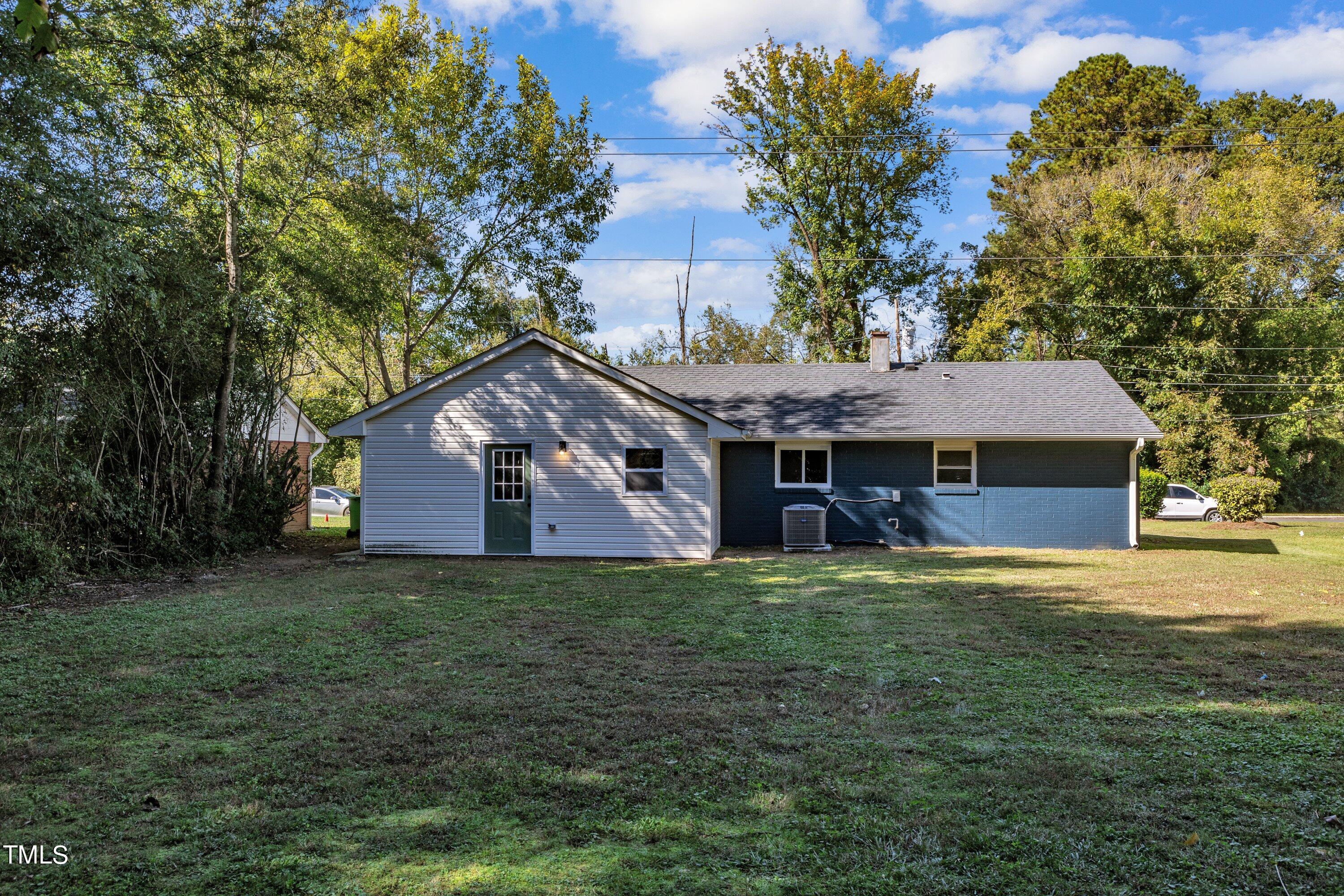 712 Bailey Drive Raleigh, NC 27610 - Photo 32 of 33 a house view with a garden space